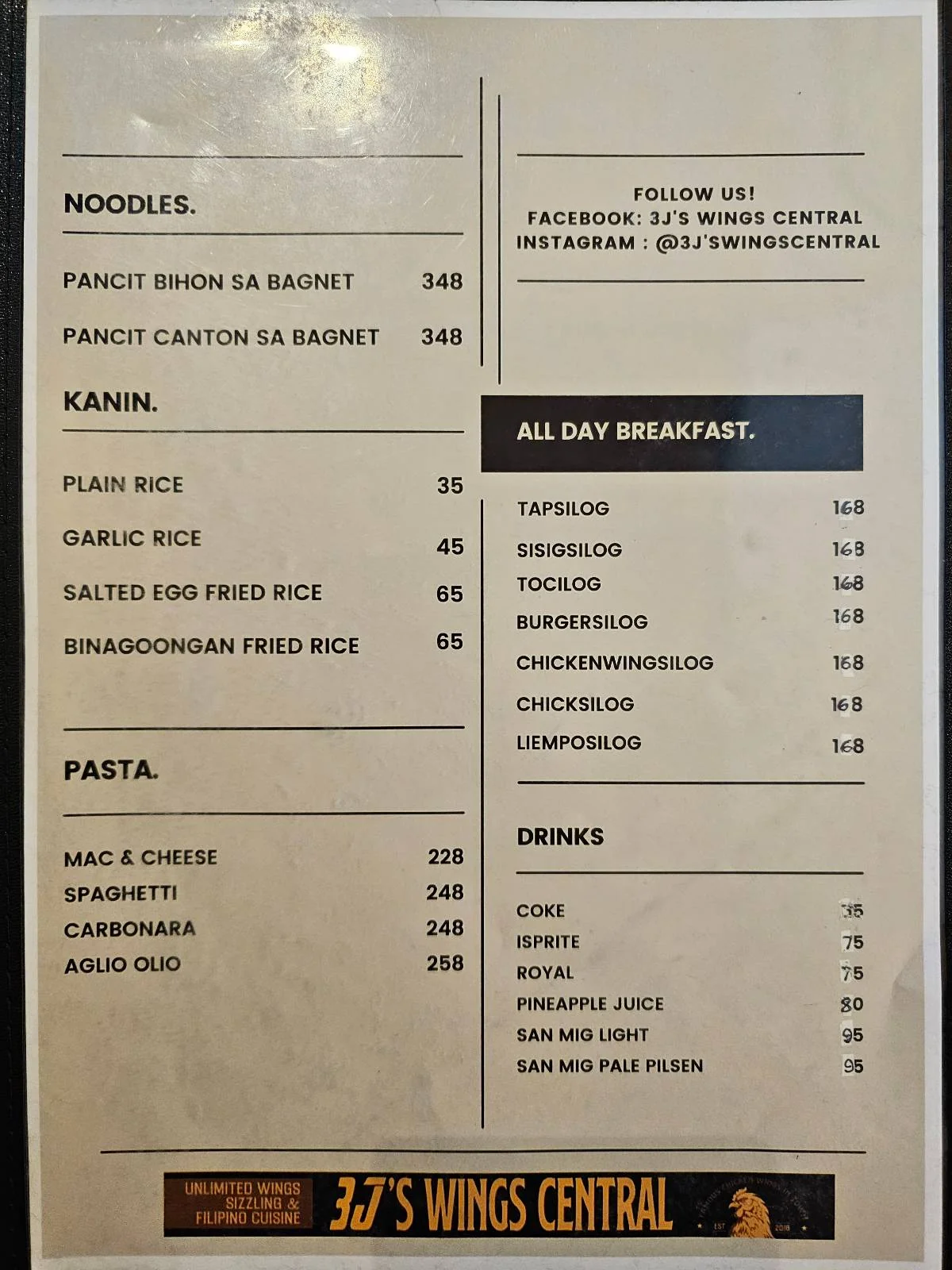 A menu from 3J's Wings Central features dishes like pancit, rice options, pasta, and an all-day breakfast selection with prices. It also includes contact information for Facebook and Instagram.