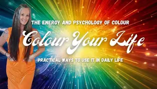 Smiling woman in orange dress, rainbow burst background. Text: "The Energy and Psychology of Colour," "Colour Your Life," "Practical Ways."