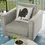 Thumbnail: Gray armchair with turkey silhouette pillow and stuffed text; outdoor setting. Stuffed Turkey Pillow, Fun Festive Decor.