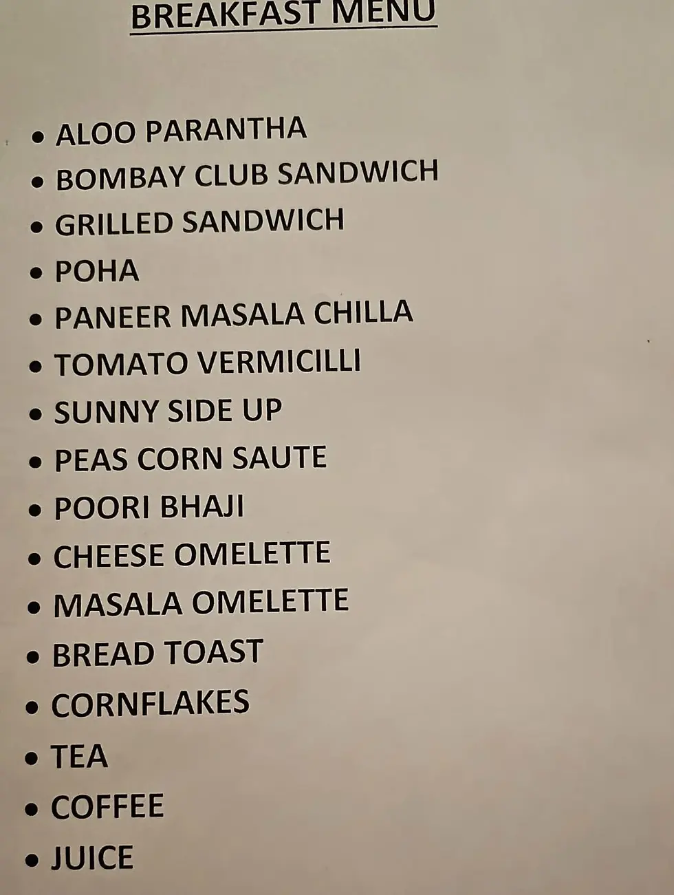 Breakfast menu with items like Aloo Parantha, Grilled Sandwich, Poha, Omelettes, Bread Toast, Tea, Coffee, and Juice on white paper.