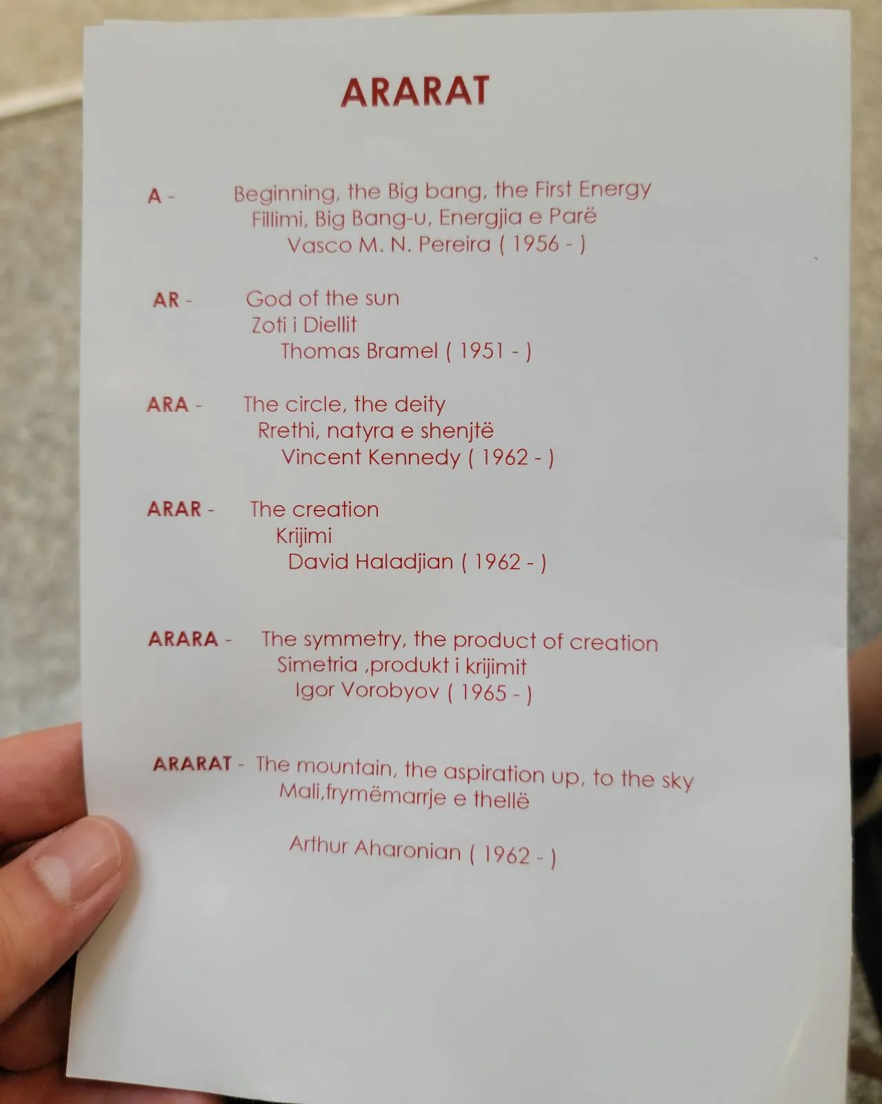 A hand holds a program schedule titled "ARARAT." It lists several performances with details for each, referencing the year of the original music debut beside them: 1956, 1962, 1965, and 1962.