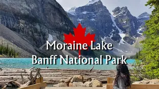 Woman sits by Moraine Lake, turquoise water, driftwood, rocky mountains in background. Text: Moraine Lake, Banff National Park.