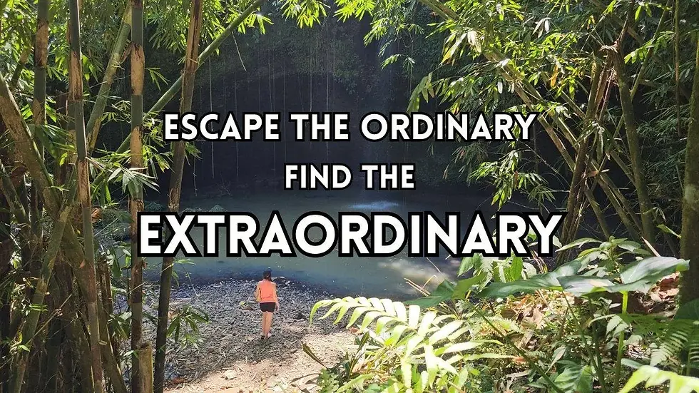 A person walks towards a serene forest pond with the text "escape the ordinary, find the extraordinary" overlaid on the image.