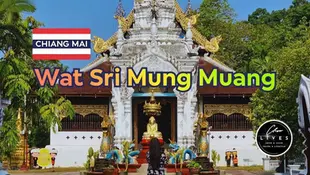 Wat Sri Mung Muang temple facade, ornate with gold and white designs. A person stands in front. Text: Chiang Mai, Wat Sri Mung Muang.