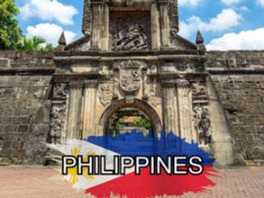 A historical stone archway with detailed carvings stands under a partly cloudy sky. The lower part of the image features a graphic of the Philippine flag and the word "PHILIPPINES." Perfect for travel enthusiasts seeking unique destinations.