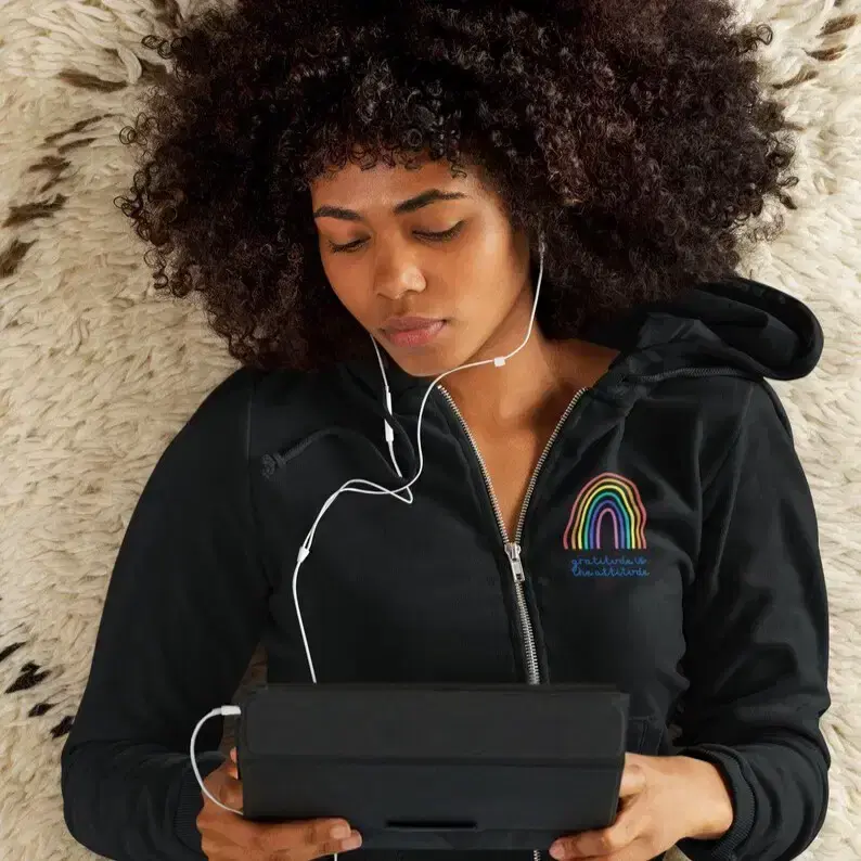 Thumbnail: Gratitude is the Attitude rainbow zip-up hoodie from Closer Lives Positive Apparel collection lifestyle view.