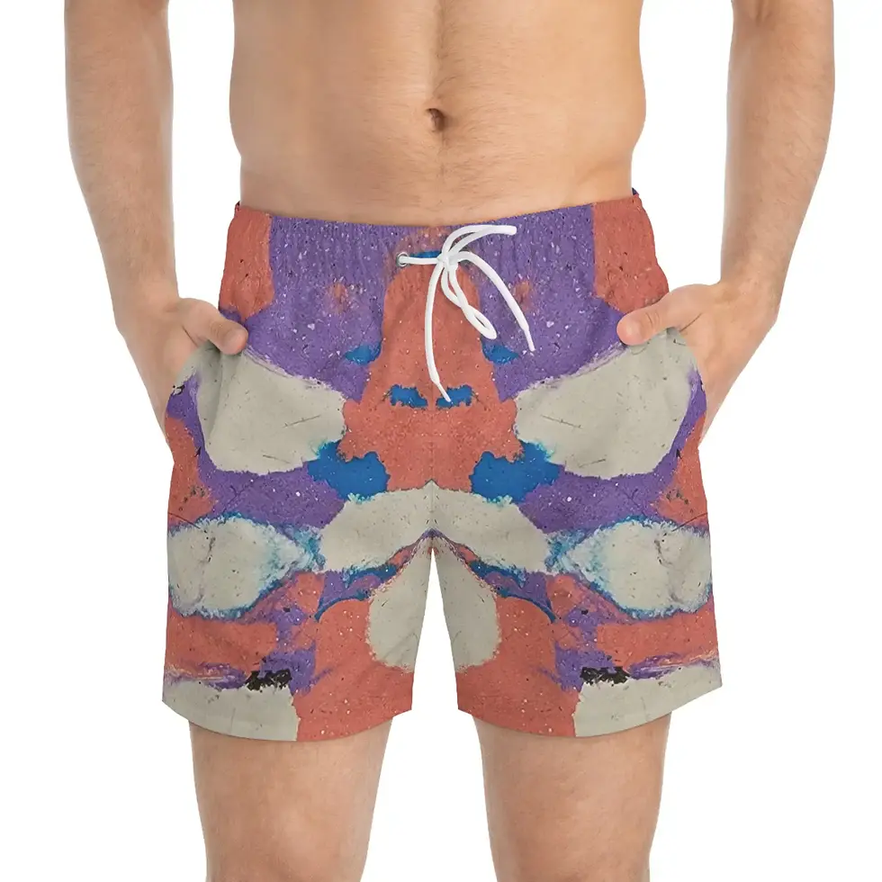 A person is wearing colorful swim trunks with an abstract pattern featuring shades of orange, purple, blue, and gray.