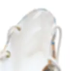 A white canvas bag with rope handles threaded through gold grommets is shown from the top.