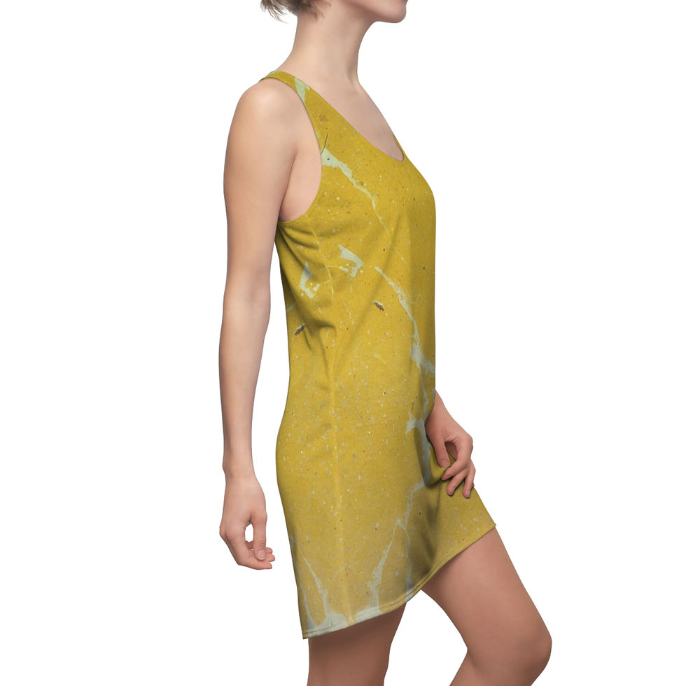 A person in a sleeveless racerback dress featuring a vibrant yellow marble pattern poses sideways against a plain background.