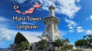 Maha Tower Langkawi: A tall, white structure with intricate design elements, set against a blue sky with the Malaysian flag and text indicating Maha Tower Langkawi, now open. Trees and a building in the foreground.