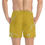 Thumbnail: Person wearing mustard yellow marble-patterned shorts from the Yellow Marble Pattern Swim Trunks collection.