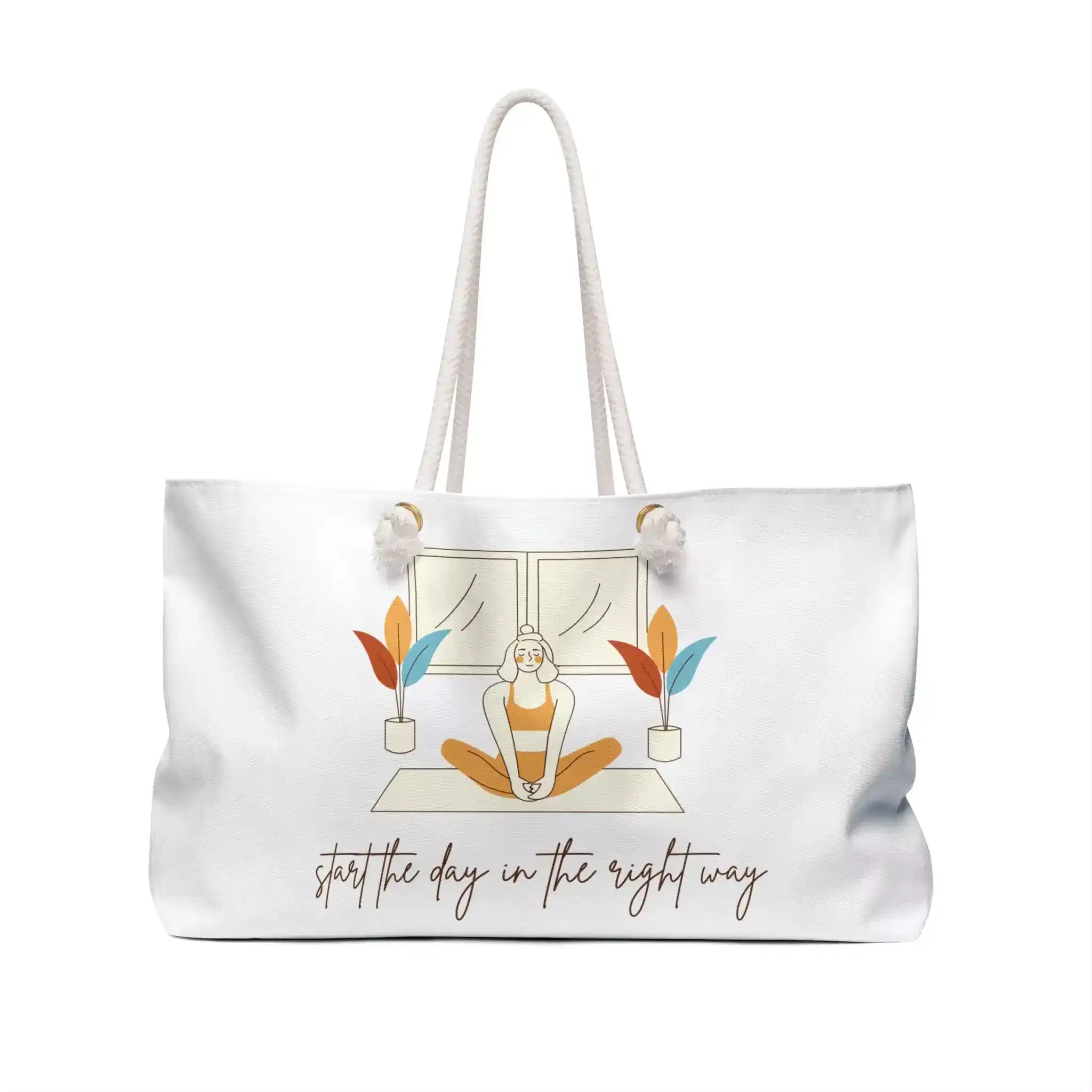 A stylish white tote bag features an artistic design with colorful geometric shapes and leaves.