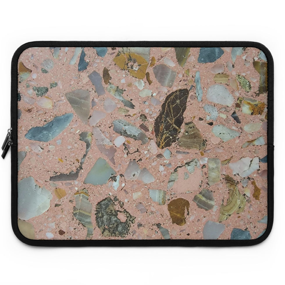 Close-up of a laptop case featuring a terrazzo-patterned design reminiscent of the Mexican Tile Style Collection.