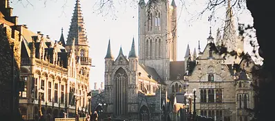 Medieval architecture and Saint Bavo’s Cathedral in Ghent’s historic center, Belgium.
