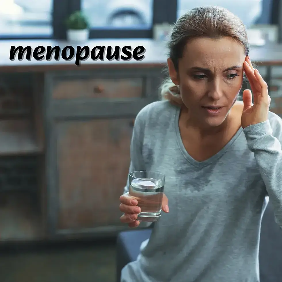 Woman in a gray shirt holding a glass of water, looking pensive. "Menopause" text above. Indoor setting with window background.