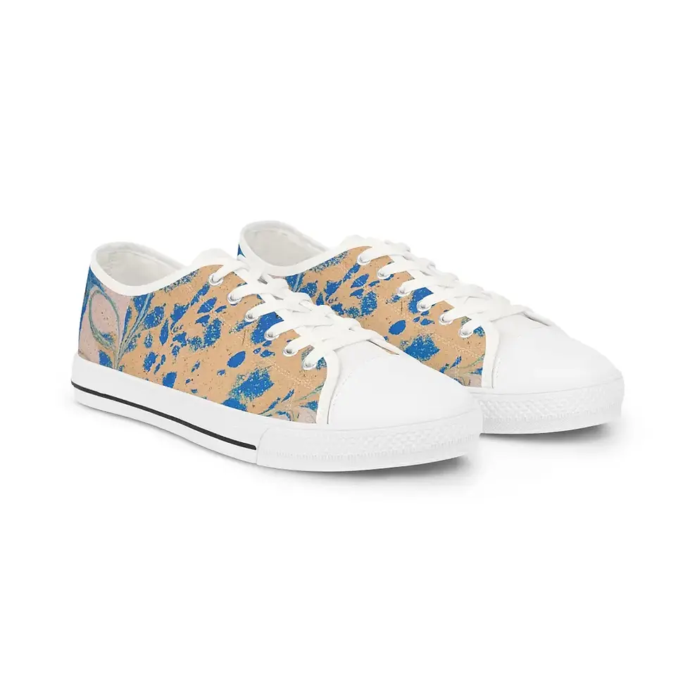 Blue and tan floral print sneakers, white soles and laces, stylish design. Closer Lives.