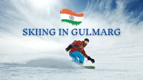 Skier in red and blue gear on snowy slope with blue sky. Text: "SKIING IN GULMARG" and Indian flag. Energetic and scenic.