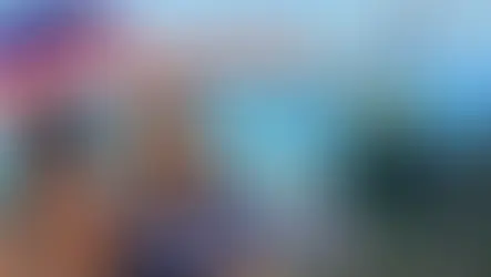 People smiling in front of a scenic ocean view, with a cable car in Langkawi. Text: "Langkawi Cable Car & Skybridge, Malaysia."