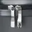 Thumbnail: Close-up of silver zippers on a gray suitcase, ready to be zipped.