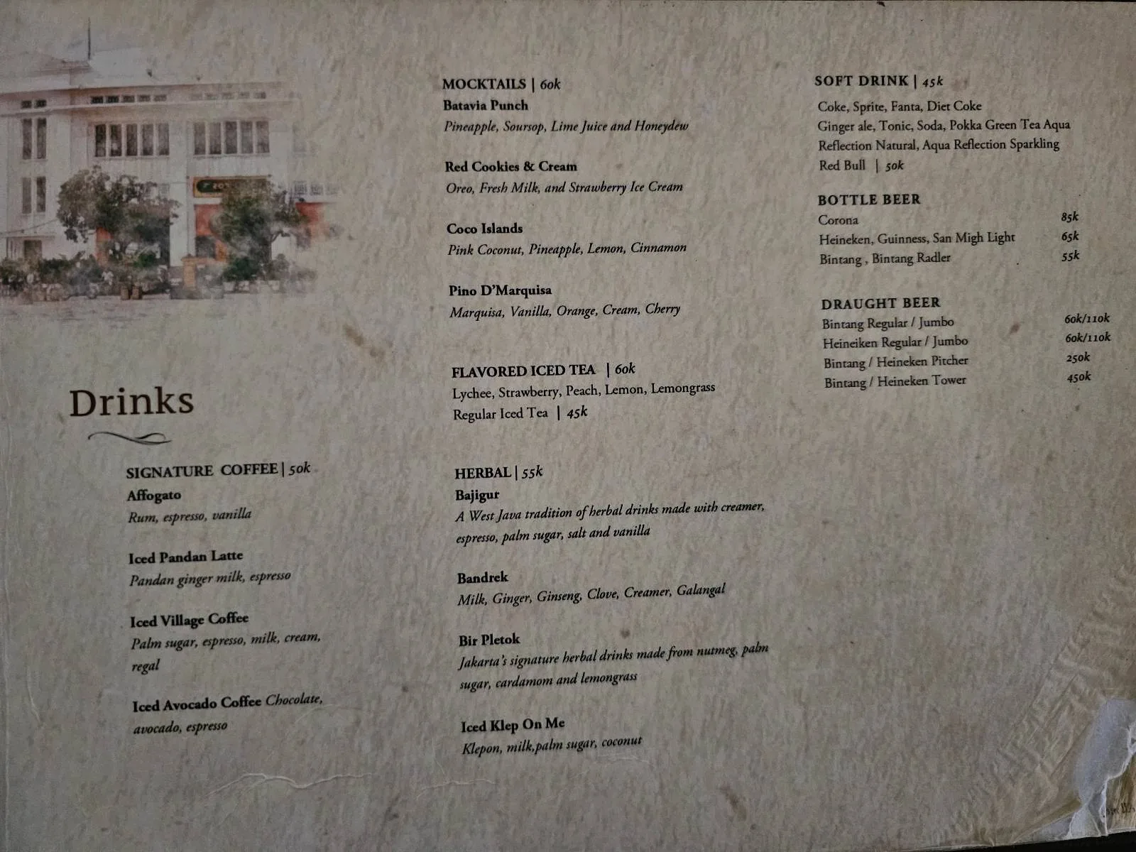 A restaurant menu on textured paper lists food and drink options in black text. The top left corner features a small illustration of a building. The headings include "Drinks" and various meal options.