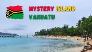Vanuatu beach scene with flag and text Mystery Island Vanuatu, turquoise water, pier, palm trees, and people walking.