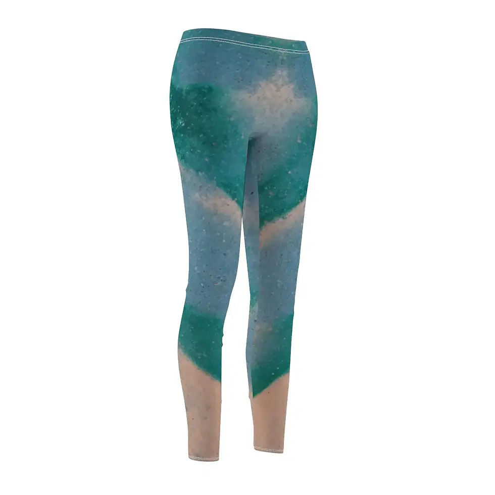 Teal and cream patterned leggings on display. Closer Lives