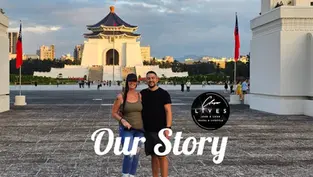 A smiling couple poses in front of the Chiang Kai-shek Memorial Hall. Blue sky, flags, text "Our Story" overlay.