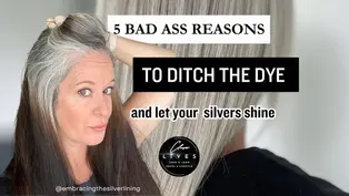 Woman with gray hair touching her head, promoting embracing natural silver hair. Text: "5 reasons to ditch the dye and let your silvers shine!"