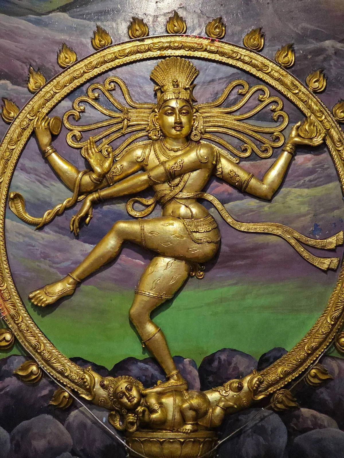 Golden Nataraja statue of Shiva performing the cosmic dance inside Sri Veeramakaliamman Temple in Little India, Singapore.