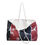 Thumbnail: Large tote bag with a red and black marble pattern, inspired by Mexican culture, and featuring sturdy white rope handles.