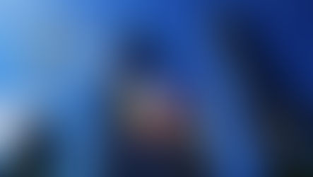 Skyscrapers under blue sky with text: Manila’s Modern Oasis: Greenbelt & Ayala Triangle. Philippine flag overlay; modern urban scene.