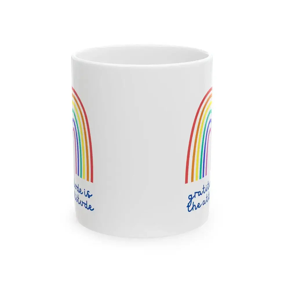 Thumbnail: Side view of white ceramic mug with partial rainbow and “Gratitude is the Attitude” text.