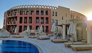 Exterior view of The Three Corners Ocean View Hotel overlooking the lagoon in El Gouna, Egypt.