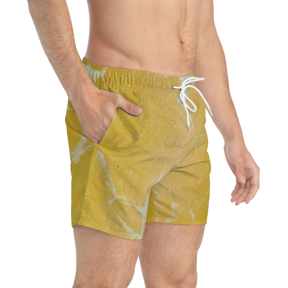 A person wearing vibrant swim trunks from the Mexican Tile Style Collection.