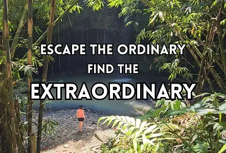 A person stands near a tranquil pond surrounded by lush green bamboo, with text: "Escape the ordinary, find the extraordinary" overlaying the sceneโperfect for those seeking off-the-beaten-path travel destinations.