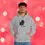 Thumbnail: Man wearing gray hoodie with black graphic that says 