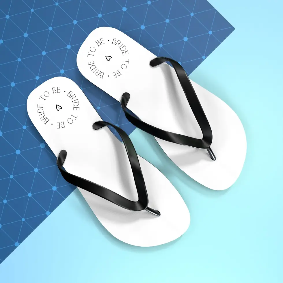 White flip flops with black straps and text 