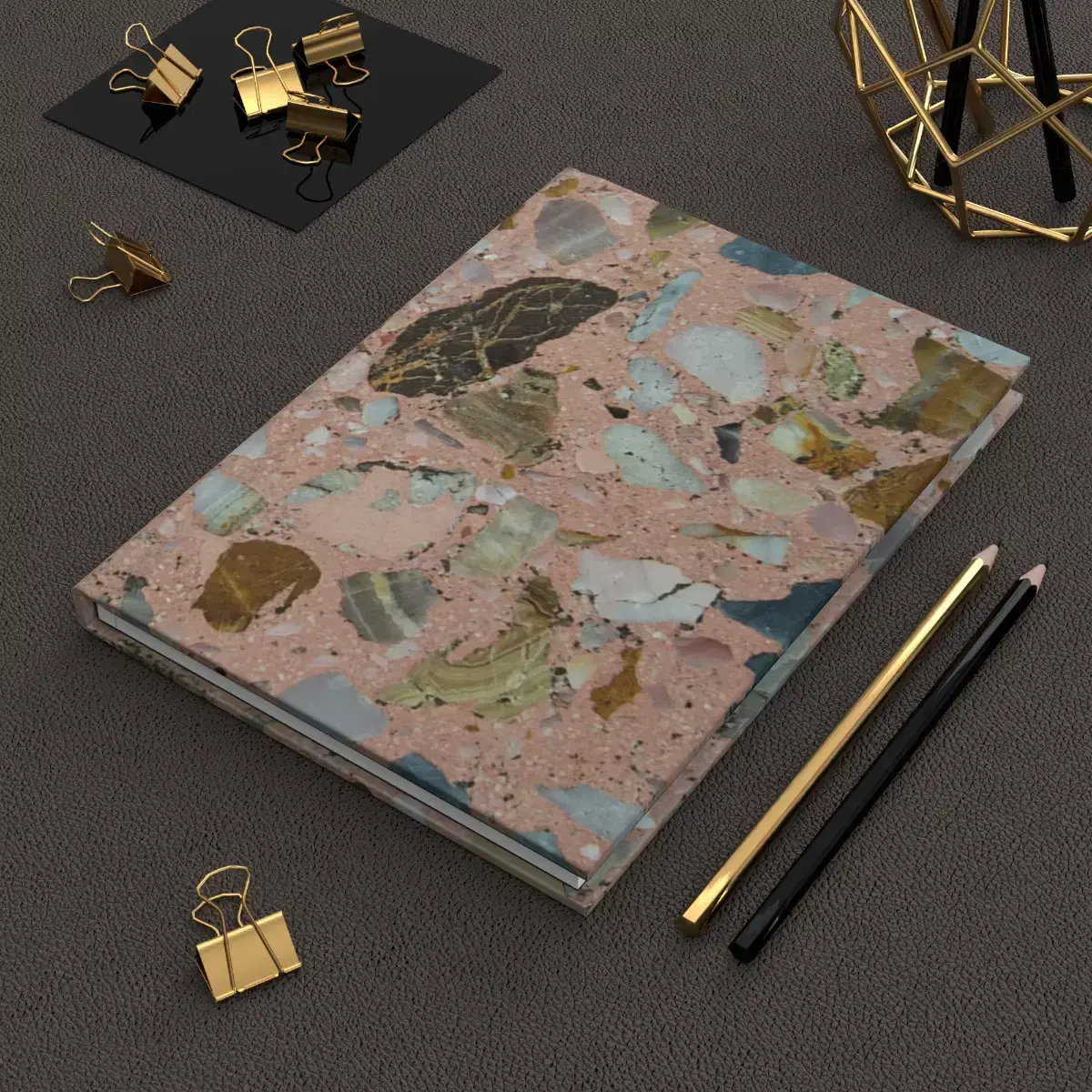 Crystal rock pattern Mexican Tile Style hardcover journal on desk with pens.