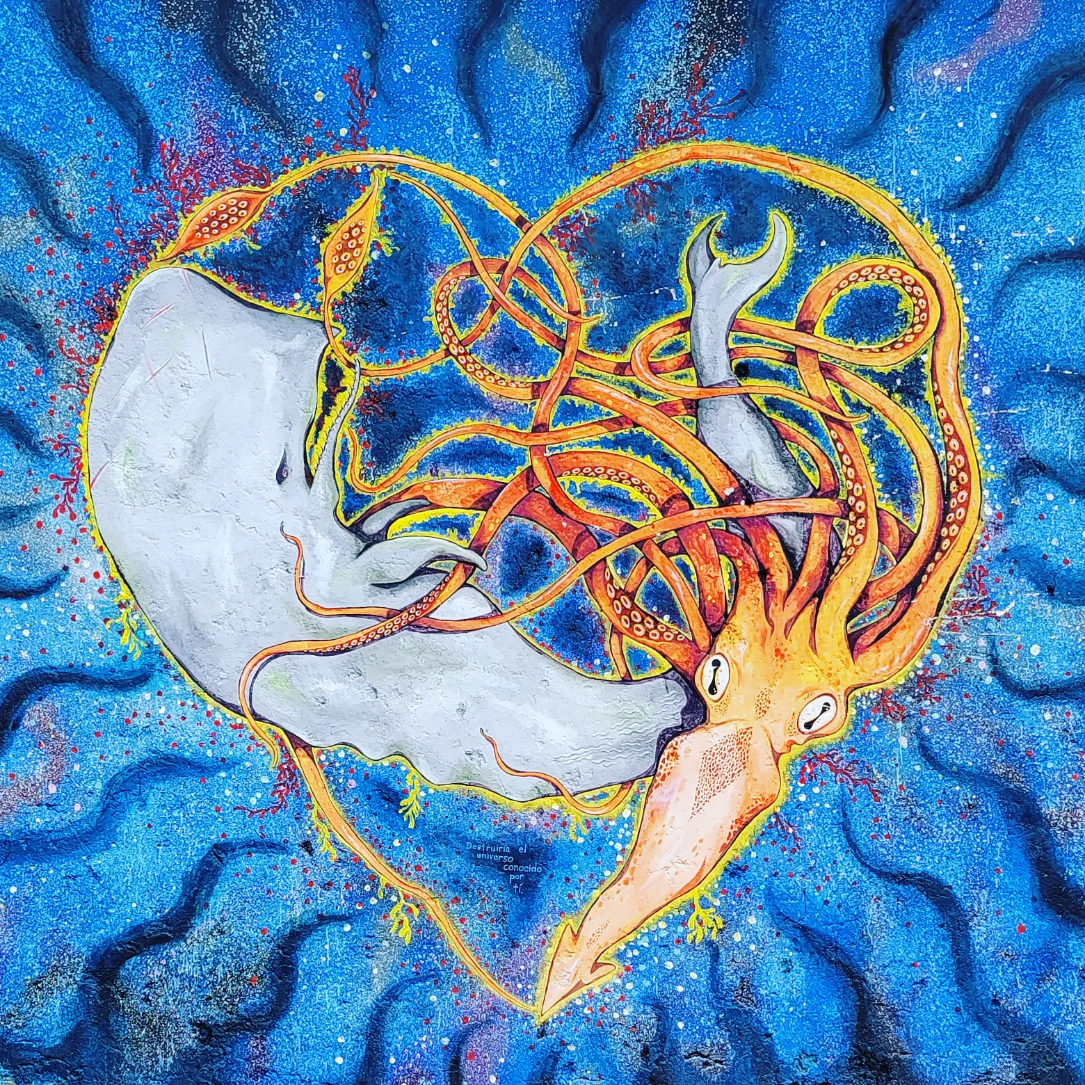 A colorful illustration featuring a whale and a squid intertwined in the shape of a heart against a vibrant blue background with swirling patterns. The squid's tentacles wrap around the whale, creating a harmonious and whimsical scene.
