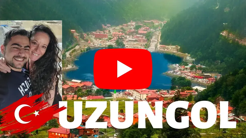 Couple smiling with a village and lake view in Uzungol. Turkish flag design, "Uzungol" text, and a red play button overlay on the image.