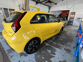 A Memorable Milestone: Getting Our Logo on the First Car at The Bay Self Drive Car Hire Workshop!
