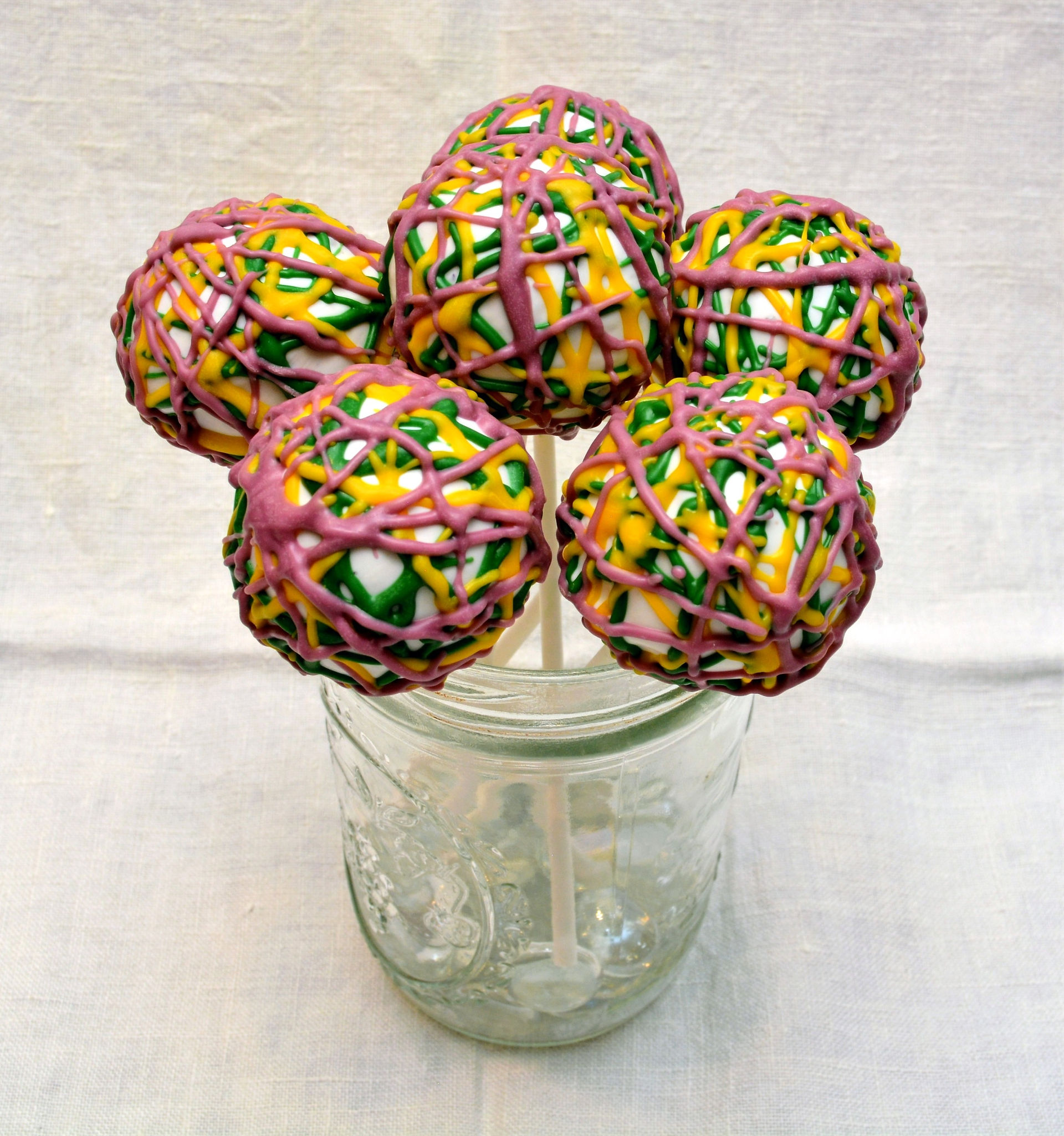 Fun and Festive Mardi Gras Cinnamon Pecan Vanilla Cake Pops 