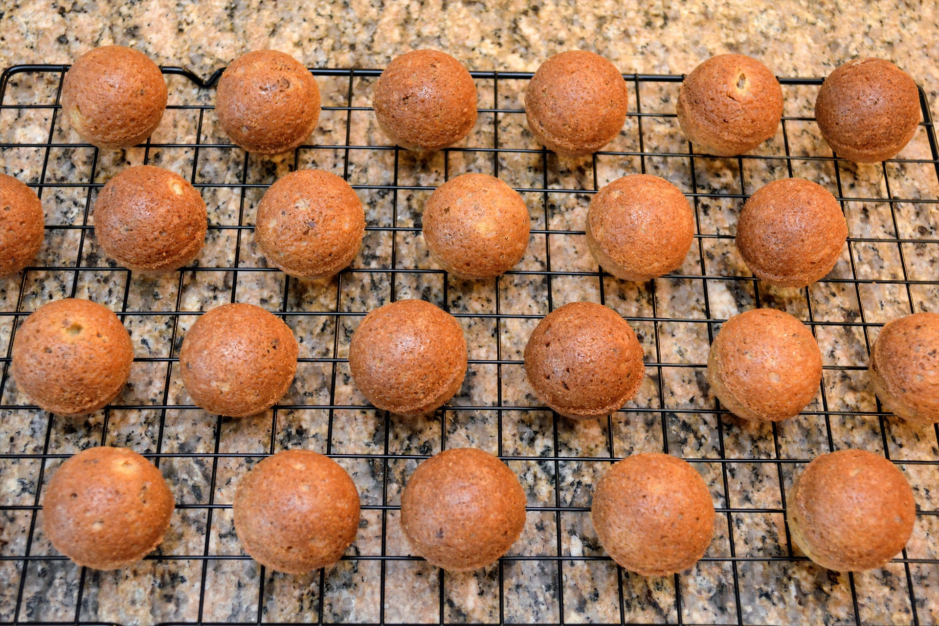 Cinnamon Pecan Vanilla Cake Pops cooling before decorating