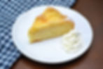 German Apple Cake with Confectioners' Sugar and Sweetened Whipped Cream