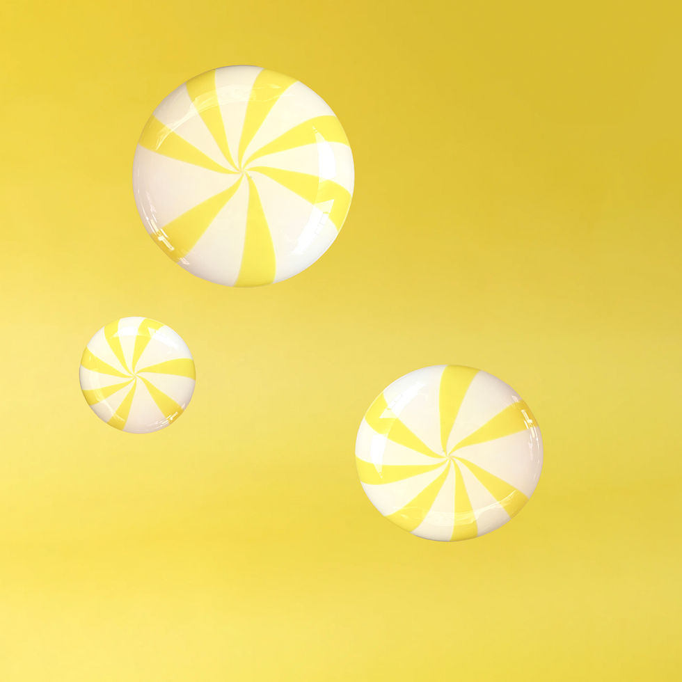 Three coatCANDY glass wall hooks by STUDIO BERG in small, medium and large, with swirling candy patterns