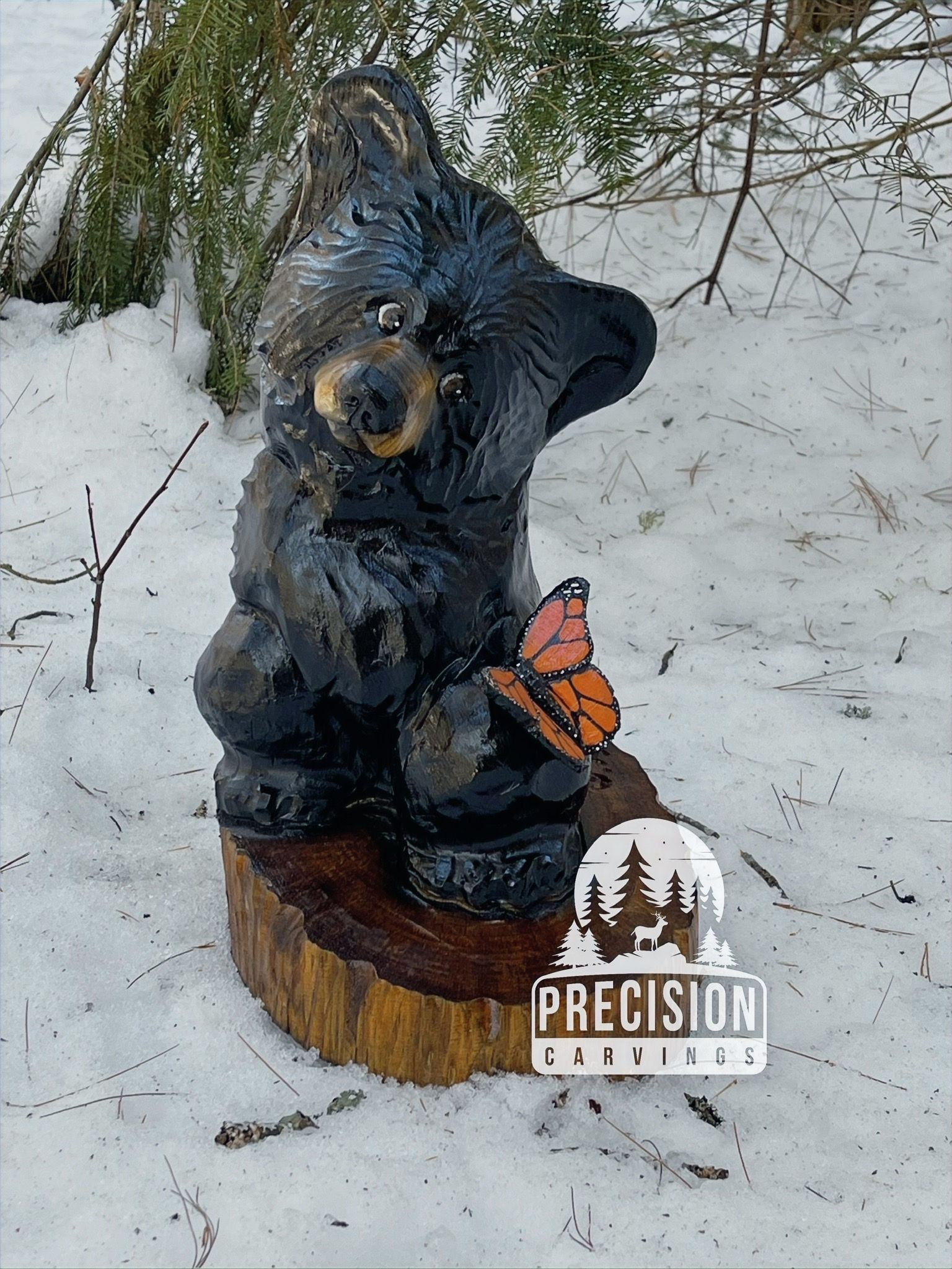 Sprout the black bear with monarch butterfly