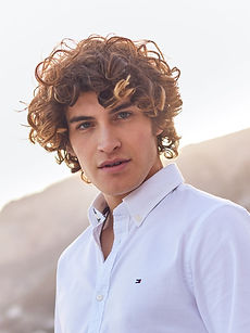Harry - A mainboard model with curly blonde/brown hair and green eyes. Represented by ROC Talent agency.