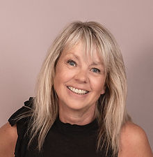 Carolle A - A headshot of a classic model with shoulder length hair, a natural expression and wearing a black turtle neck represented by Roc Talent agency UK