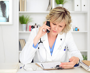 Menopause specialist educating women about hormone therapy and lifestyle changes