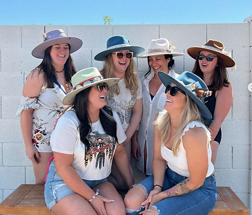 women with custom cowgirl hats 